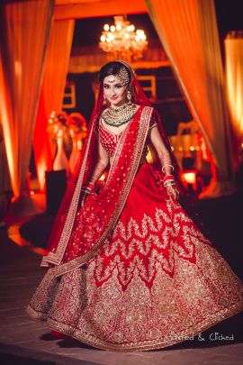 Bridal Lehenga - Gold and Red Wedding Lehenga With Golden embroidery | Akshay & Arshiya wedding story | WedMeGood #wedmegood #indianbride #indianwedding #bridallehnga #weddinglehenga #bridalredcolor #redlehenga Sabyasachi Bridal, Bridal Lehenga Designs, Bridal Dupatta, Wedding Lehenga Designs, Indian Bride Outfits, Bridal Lehenga Collection, Designer Bridal Lehenga, Indian Bridal Lehenga, Lehenga Wedding