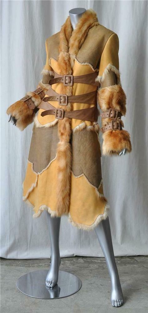 Stunningly beautiful shearling/fur coat - so ultra warm and deluxe! The buckles are absolutely gorgeous and lend so much style to this patchwork coat - retails for $5,000.00. Designer: Voyage Condition: New without tags; the care label states that the hide naturally has imperfections in the leather and that even with premium hides this is the case. We think it only adds to the character of the coat anyway - it looks gorgeous! Color: Brown, Tan, Light Golden Pumpkin and Dark Honey Content: Shearling Leather/Fur - we're uncertain what kind of fur the longer one is - but it's soft and has a beautiful wave to it. Unlined, but is soft shearling and fur on the inside Designer Size: Marked US 10, IT 44, FR 40, but best for a US 4/6. Made in: Italy Measurements (taken with garment lying flat): Che Fur Runway, Patchwork Coat, Long Coat Jacket, Funky Outfits, Fantasy Story, Medieval Clothing, Character Ideas, Alternative Outfits, Fur Fashion