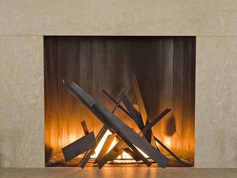 Tapering steel plates inside the fireplace bring geometric style to the room Fireplace Sculpture, Fireplace Contemporary, Fireplace Electric, Wooden Stove, Fireplace Box, Bd Design, Style Mantel, Western Bar, Metal Fireplace