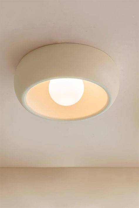 Discover the essence of minimalist design with our Kovacs Ceiling Light a testament to elegance and durability. Crafted from high-quality carbon steel and finished with a sophisticated baking paint process, it promises longevity and a pristine appearance.Its small stature belies its significant impact, casting a warm, inviting glow that elevates any space. This lamp's simple circular shape and muted color palette allow it to blend seamlessly with your decor, providing a harmonious balance betwee Mid Modern House, Round Ceiling Light, Green Armchair, Round Ceiling, French Architecture, Muted Color Palette, Edison Bulb, Design Minimalista, Large Painting