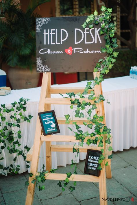 Help Desk Sign Board - Wedding sign board when the guests are checking in the hotel, resort or palace Help Desk Wedding, Indian Muslim Wedding, Wedding Sign Board, Wedding Welcome Table, Wedding Pillars, Mehendi Decor Ideas, Mehendi Decor, Planning Book, Lobby Decor