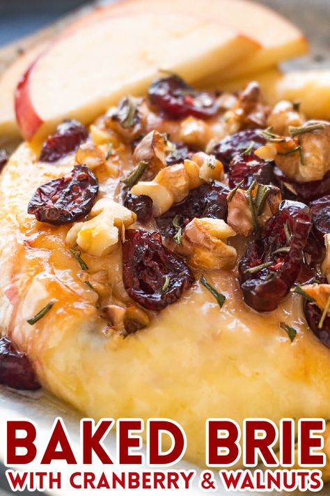 Learn how to make baked brie with cranberries and walnuts, it's the perfect holiday party appetizer. It's quick, fancy, and tastes delicious! Brie Honey Walnut, Walnut Appetizer Recipes, Christmas Party Food For A Crowd Appetizers Baked Brie, Baked Bree Appetizers, Sweet Baked Brie Recipes, Sweet Brie Recipes, Cranberry And Brie Appetizer, Thanksgiving Baked Brie, Baked Brie With Cranberries