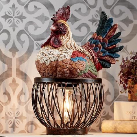 Colorful 3-D resin rooster on round wire base. Uses 40-watt max. bulb not included. 8 1/2" w x 11" h x 6" d....Buy Now, Pay Later with Ginny's Credit Shopping! Rooster Canisters, Fall Yard Decor, Rooster Kitchen Decor, Boho Farmhouse Decor, Chicken Coop Signs, Country Rooster, Animal Lamp, Rooster Kitchen, Rooster Decor