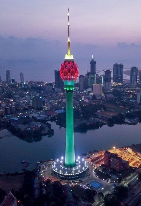 The Lotus Tower in Colombo, Sri Lanka, stands as a symbol of technological and architectural advancement in the country. Rising to a height of 356 meters, it is the tallest self-supported structure in South Asia and represents the blooming of a lotus flower, which is a significant symbol in Sinhalese culture. Officially opened in 2019, the tower serves multiple purposes, including telecommunications, observation, and entertainment, with a revolving restaurant and an observation deck that offe... Things To Do In Colombo Sri Lanka, Beauty Of Sri Lanka, Lotus Tower, Lotus Tower Sri Lanka, Revolving Restaurant, Buddhist Temple Sri Lanka, Anuradhapura Sri Lanka, Holiday Centers, Colombo Sri Lanka