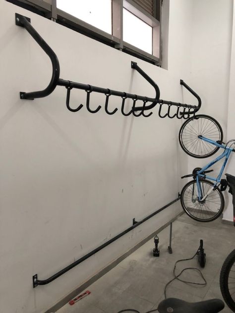 Bicycle Hanging Ideas, Bicycle Rack Design, Bike Hanger Wall, Bicycle Parking Design, Wall Mounted Bike Storage, Garden Bike Storage, Rack Velo, Outdoor Bike Storage, Bike Rack Garage