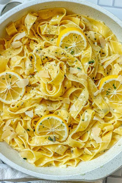 picture of papardelle pasta in a pan with sliced lemons, garlic, cream sauce, and herbs crumbled on ... - Provided by Courtney O'Dell Creamy Lemon Garlic Pasta, Lemon Pasta Recipes, Squash And Zucchini, Crunchwrap Supreme, Lemon Garlic Pasta, Lemon Garlic Sauce, Butter Pasta, Baked Asparagus, Easy Pasta Dishes