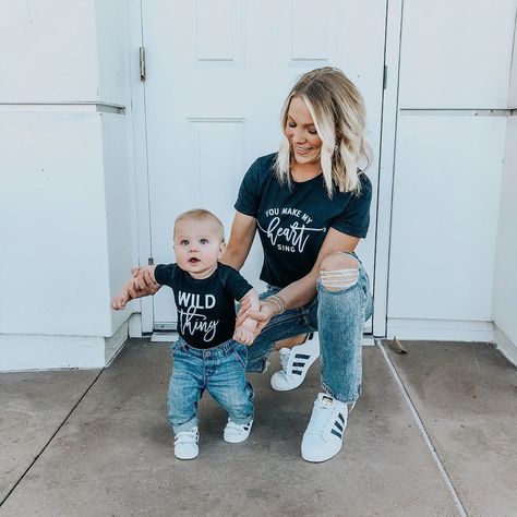 Image may contain: one or more people and people standing Newborn Bodysuit, Black Shirts, Family Brand, Daughters Shirt, V Neck Shirt, Mommy And Me Outfits, Mama Shirts, Valentine's Day Outfit, People Standing