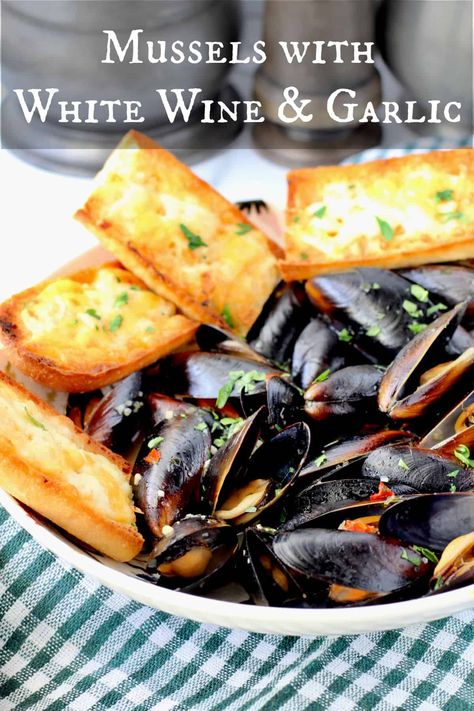 Serve these French-style mussels, or Moules Marinières, as a first course with crusty garlic cheese bread, or as a main course over pasta or French fries, for a wonderful dinner for two. Mussels In White Wine Sauce Garlic Cream, Mussel Pasta White Wine, Mussels With White Wine, Steamed Mussels In White Wine Garlic, French Mussels In White Wine, Cajun Seafood Boil, Seafood Dish Recipes, Steamed Mussels, Mussels Recipe