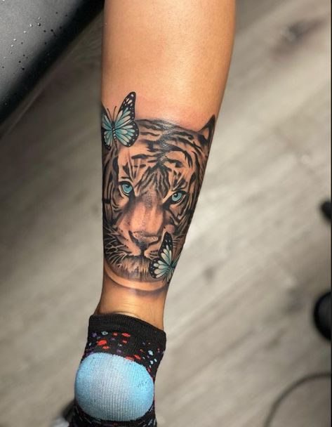 Leg Coverup Tattoos Women, Lion Tattoo Black Women, Lion Leg Tattoo Female, Calve Tattoos For Women, Lion Calf Tattoo, Back Of Calf Tattoos For Women Calves, Cute Foot Tattoos, Cute Thigh Tattoos, Small Girly Tattoos