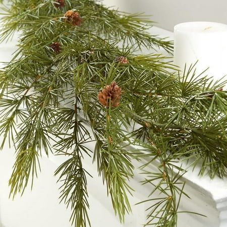 Add a touch of nature to your home dcor with the Weatherproof Faux Wispy Pine Garland by Factory Direct Craft. This versatile garland is perfect for creating a festive atmosphere for the holidays, or for adding a year-round touch of greenery to your space, either indoors or outdoors. Christmas Sprays, Faux Garland, Christmas Mantles, Galaxy Jar, Evergreen Christmas, Pinecone Garland, Winter Greenery, Christmas Garlands, Holiday Greenery