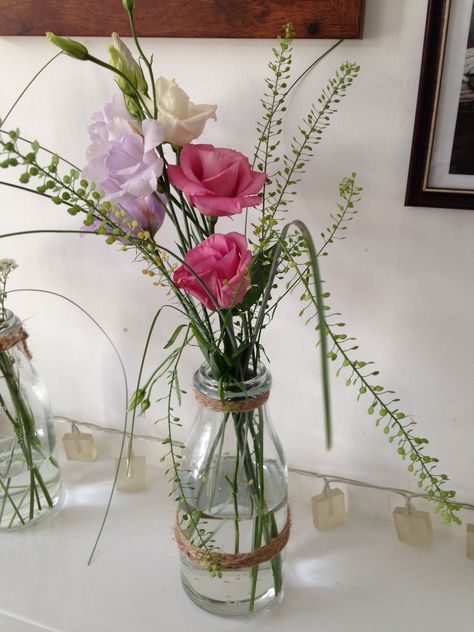 A simple Ikea milk bottle vase with a bit of brown string was a cheap but affective technic for these beautiful natural flowers Milk Bottle Flowers, Milk Bottle Vases, Milk Bottle, Glass Vase, Flower Arrangements, Our Wedding, Sweet Home, Vase, Table Decorations