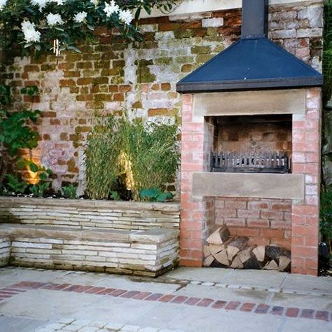 7 of the Most Perfect Outdoor Fireplaces | ELB Fireplaces Small Courtyard With Fireplace, Brick Bbq With Chimney, Red Brick Courtyard, Courtyard Fireplace, Cottage Courtyard, Large Courtyard, Rustic Brick Wall, Bbq Hut, Stadium Seating