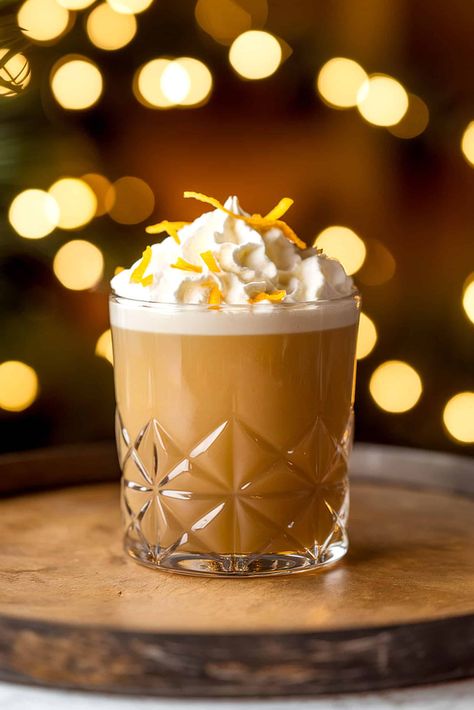 Serve up the festive flavors of the Nutcracker cocktail, a sweet and creamy delight perfect for the holidays. With rich notes of coffee, almond, orange, and caramel, this luxurious drink is sure to be a holiday favorite. #HolidayCocktails #FestiveDrinks #NutcrackerCocktail Christmas Alcoholic Coffee Drinks, Kahlua Drinks Christmas, Nutcracker Drink Recipe, Nutcracker Cocktail, Grand Marnier Drinks, Amaretto Cocktails, Cocktail Candles, Irish Cream Drinks, Cocktail Amaretto