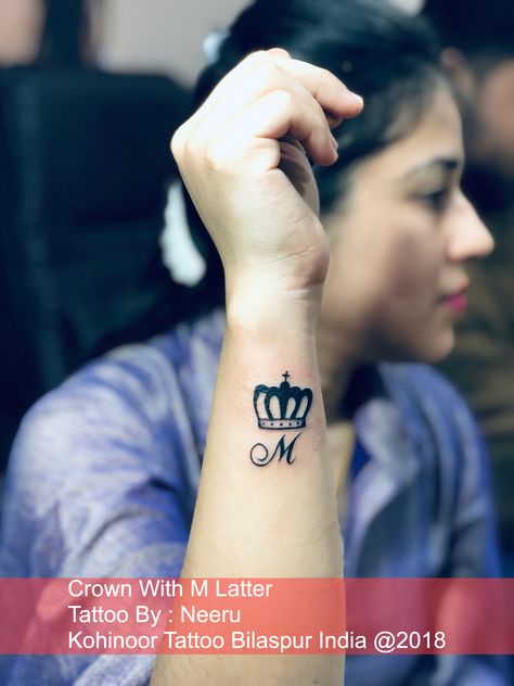 Crown with m Latter Tattoo Name Tattoos For Girls, Wrist Tattoos Words, Tattoo Words, Side Wrist Tattoos, Crown Tattoo, Name Tattoo, Word Tattoos, Tattoo Designs For Women, Tattoo Lettering