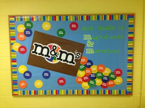 Back to school bulletin board Beginning School Year Bulletin Board, Beginning Of The Year Bulletin Boards Preschool, Eye Catching Bulletin Boards, M&m Bulletin Board Ideas, M&m Classroom Theme, School Supply Bulletin Boards, Smarties Bulletin Board Ideas, Candy Theme Bulletin Board Ideas, Sweet Bulletin Board Ideas