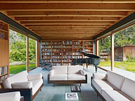 Large sliding glass doors suspend the living room within the landscape for family gatherings or larger events. Piano Library, Room Pics, California Ranch, Piano Room, Slate Flooring, Sustainable Home, November 17, Style At Home, Sliding Glass Door