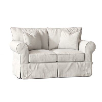 This slipcovered loveseat adds a transitional breath of fresh air to your living room or den. It showcases traditional rolled arms, and a square seat for a casual and clean look that lets you kick back and relax. There are a variety of slipcover fabric options, so it’s easy to find the color that works best in your home. This loveseat’s two back cushions and two seat cushions are filled with foam and down feathers for an inviting look, and are also removable for easy cleaning. Plus, it’s made in Slipcovered Loveseat, Throw Pillow Fabric, Tailored Skirt, Pillow Fabric, Living Room Furniture Sofas, Toss Pillows, Custom Upholstery, Room Sofa, Fresh Air