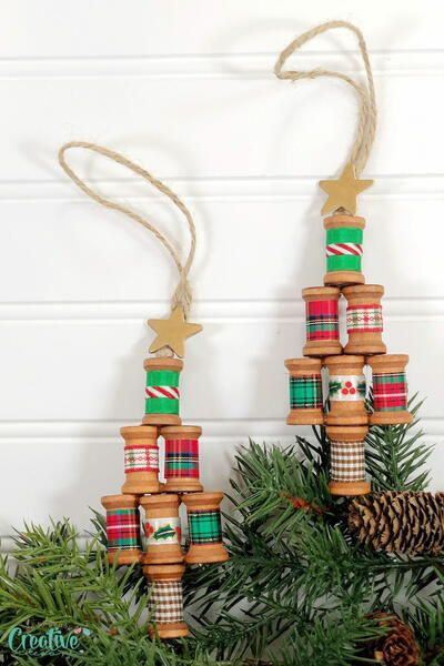 Wooden Spool Ornaments Wooden Spool Ornaments, Spool Christmas Ornaments, Spool Christmas Tree, Spool Ornaments, Wooden Spool Crafts, Christmas Clothespins, Spool Crafts, Wooden Spool, Holiday Tree Decorations