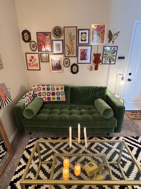 Simple Maximalist Living Room, Green Sofa Maximalist, Green Couch Sitting Room, Green Velvet Sofa Bedroom, Green Couch Studio Apartment, Couches Living Room Aesthetic, Dark Olive Green Sofa, Green Velvet Couch Decor, Green Velvet Couch Aesthetic