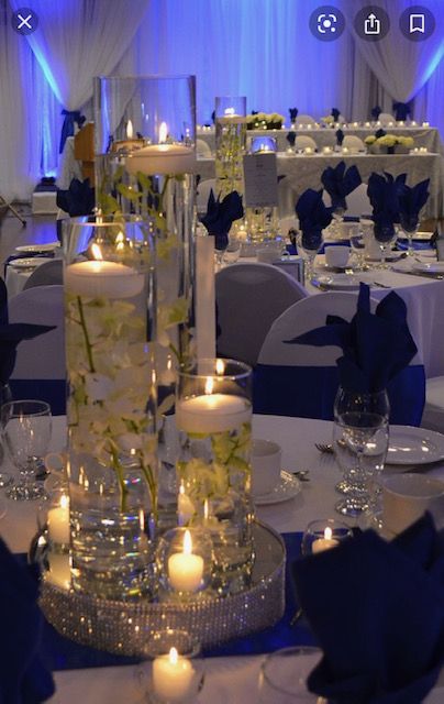 Blue Royal Wedding Decoration, Royal Blue Floating Candles, Royal Themed Wedding Decor, Blue And Gold Flower Centerpieces, Royal Blue Centerpieces Party, Quince Centerpieces Blue, Royal Blue And Silver Wedding Decor, Quince Decorations Navy Blue And Silver, Navy Blue Quince Centerpieces