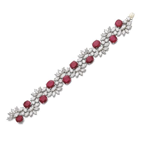 RUBY AND DIAMOND BRACELETSet with oval and cushion-shaped rubies, highlighted with marquise-shaped and brilliant-cut diamonds, length approximately 175mm, maker's mark for Jacques Timey. ||| sotheby's Ruby Bracelet, Alternative Jewelry, Ruby Jewelry, Diamond Bangle, Ruby Gemstone, Maker's Mark, Sea Glass Jewelry, Diamond Bracelets, Vintage Bracelets