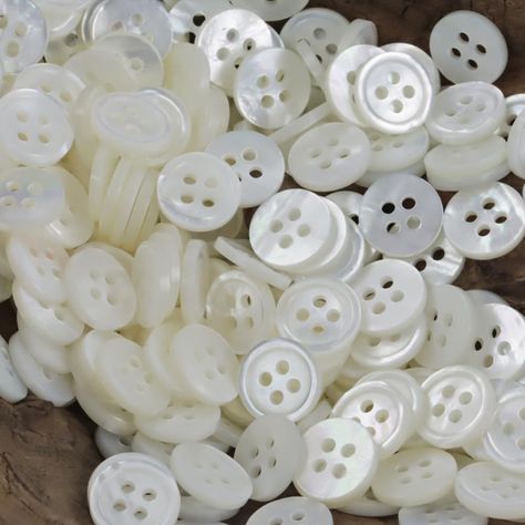 PRICES MAY VARY. 20 Pcs genuine MOP buttons: diameter 10mm for most women shirts, pants, hat, sweaters or other DIY crafts.dresses, skirts, Natural shell buttons with beautiful rainbow irredecent effect, normally used for Haute couture or tailored clothes, best choice for silk, cashmere, wool material. The buttons was shiny with colors and lights, please gently care them with professional cleaners. All buttons made of natural mother of pearl, the pictures can't show the actualy beautiful gloss. Polo Diy, Mop Buttons, Bead Tips, Rainbow Pearl, Tailored Clothes, Professional Cleaners, Shell Buttons, Beautiful Rainbow, Sewing A Button