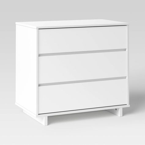 Bring a minimalist feel to any room with this Modern 3-Drawer Dresser from Room Essentials™. This dresser makes a practical addition to your bedroom furniture. It features a streamlined design in a laminated finish for a clean modern look, and a solid color that easily pairs with a variety of decor styles. The three spacious drawers provide plenty of room for storage of bedroom essentials, while the flat top creates a space for a lamp, books or other small decorative items. Place it next to your Desk Dresser Combo, Small White Dresser, Dresser White, 3 Drawer Dresser, Versatile Furniture, White Dresser, Bedroom Essentials, Simple Room, White Nightstand