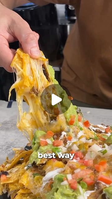 The Man App on Instagram: "Take your nacho game to sky-high levels with these 21-layer Air Fryer Nachos! 🧀

Perfect for your next guys’ night or when you just need that cheesy fix. Craving more bold bites and where to find them? The Man App is also your culinary sidekick. Explore the best local markets, delis, and more!

📲 Download the app using the link in our bio!

•
•
•

#ManAppJourney #GentlemansGuide #UrbanExplorer #LuxuryLifestyle #AdventureSeeker #RefinedLiving #CraftedExperiences #BespokeTravel #TheManA pp" Airfryer Nachos, Nachos Casserole, Air Fryer Nachos, Mexican Sides, Airfryer Recept, Philips Air Fryer, Cheesy Nachos, Instagram Recipes, Guys Night