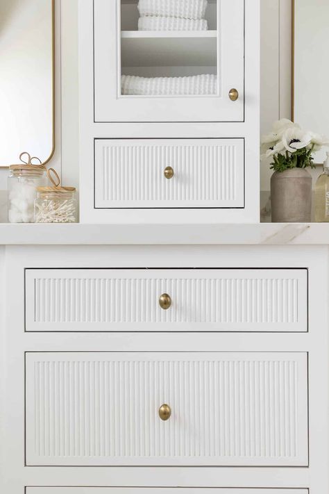 The Look: Port Newport P.2 - Mindy Gayer Design Co. Brooke Wagner Bathroom, White Reeded Vanity, White Fluted Kitchen Cabinets, Gold Bathroom Sconces, Gold And White Bathroom, Coastal Family Home, Interior Doors Styles, Drømme Bad, Mindy Gayer Design