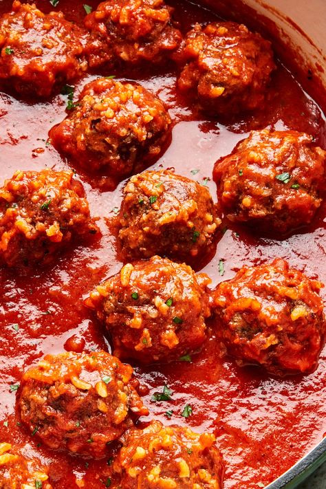 Porcupine meatballs!? These beef meatballs look like little porcupines because of the way the grains of rice stick out of them. Served in a light and easy red sauce, it’s a fun take on a classic. Porcupine Meatballs Oven, Easy Red Sauce, Porcupine Meatballs Recipe, Ground Beef Meatballs, Porcupine Meatballs, Red Sauce Recipe, Meatballs And Rice, Meatball Sauce, The Modern Proper