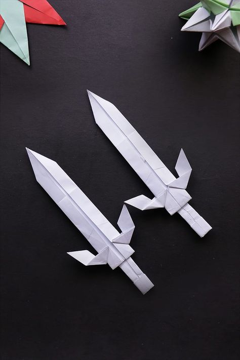 We will make Easy Origami Sword today.  Please SUBSCRIBE to our channel, we'll be posting more videos soon.  #origami #sword #ninja #arts #crafts #diy #artandcrafts #papermade #doityourself #paperfolding #origamieasy Dnd Origami, Paper Swords Craft, Origami Knife, Dragon Origami, Narrative Illustration, Paper Room Decor, Origami Easy Step By Step, Star Wars Origami, Origami Leaves