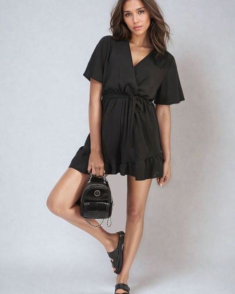 Step out in style and charm with the Eleanor Belted Wrap-Over Frill Playsuit! This piece combines elegance with a playful twist, making it a perfect choice for sunny days out or chic evening gatherings. 😍 Available in Black, one-size (8-14) Days Out, Playsuit, No Frills, Sunny Days, Cowboy Boots, In Style, Sunnies, Jumpsuit, Sleek