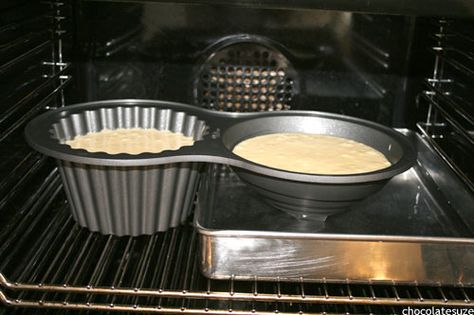 top of the cupcake bakes faster than the bottom because its smaller and theres less batter   put another pan half filled with water under the lid Cupcake Cake Pan, How Many Cups Of Batter For Cake Pans, How Much Cake Batter For 10 Inch Pan, How Much Batter Per Cake Pan, Bigger Bolder Baking Mug Cakes, Giant Cupcake Recipes, Giant Cupcake Cake, Wilton Cupcake Cake Pan, Chocolate Giant Cupcake