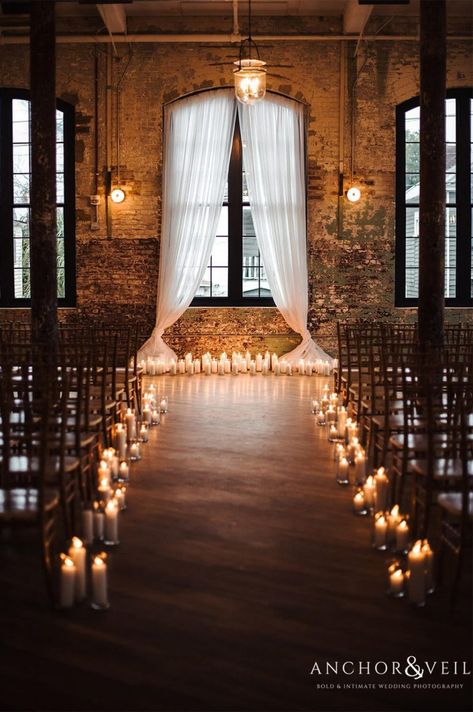 25 Eye-dropping Wedding Lighting to Make Your Big Day Swoon - Clarity Wedding- Wedding Colors,Ideas and invitation tips Wedding Sign Ideas, Dark Wedding Theme, Candlelit Wedding, Candle Lit Wedding, Wedding Alters, Ceremony Candles, Indoor Wedding Ceremonies, Nye Wedding, Wedding Altars