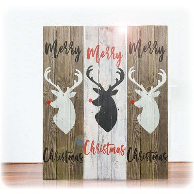 This farmhouse style is here to stay and this rustic wood sign is perfect for your front porch or by your fireplace. Dress Rudolph up with a big red bow or add some lights to create a holiday scene that will be different from all your neighbors This sign is made with 100% reclaimed wood, built and hand-painted in the USA. Naturally, weathered wood will have screw holes, nail holes, dents, dings, and scratches showing off the years of aging that can't be faked Color: White | The Holiday Aisle® Re Farmhouse Fixer, Wood Plank Walls, Merry Christmas Sign, Christmas Signs Wood, Reclaimed Wood Wall, Rustic Wood Signs, Christmas Sign, Reclaimed Barn Wood, Rustic Signs