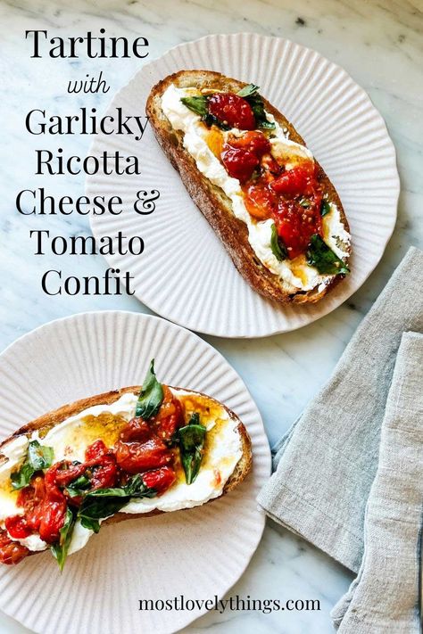 Garlicky ricotta cheese and tomato confit tartine takes a little more time and effort than most tartines. But trust me, it's worth it. The flavor is so good you'll still be thinking about it the next day. Tomato Confit, Cheese And Tomato, Sherry Vinegar, The Next Day, Slice Of Bread, Ricotta Cheese, Cherry Tomatoes, Trust Me, Worth It