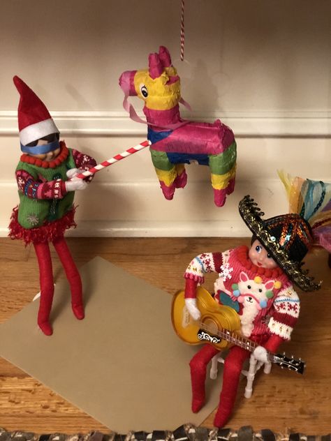 Elf on the shelf. Mexican Fiesta.  Let’s Party Amigos, it’s pinyata time with James and Meebles. Mexican Elf On The Shelf Ideas, Mexican Elf On The Shelf, Ugly Christmas Sweater Ornament, Elf Printables, Christmas Tree Costume, Diy Ugly Christmas Sweater, Elf Sweater, Piñata Ideas, Christmas Tree Sweater