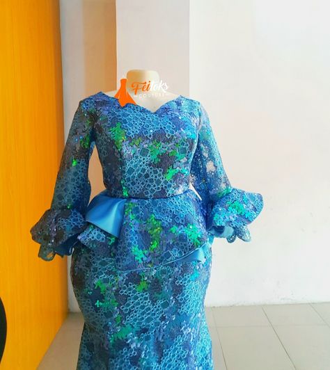 Blue Lace gown style Peplum Gown Lace Aso Ebi, A Shape Gown Lace Aso Ebi, Peplum Gown Styles, Asoebi Lace, Peplum Gown, Peplum Lace, Best African Dresses, Lace Gown Styles, Neck Designs For Suits