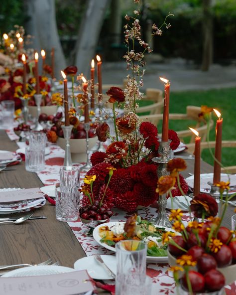 A candlelit dinner in Carmel Valley. Photo: @emily.magers Planning + Design: @honeythymeevents  Venue: @stonepineestate Video: @kimalvaradofilms  Content Creator: @withlovecontent   Caterer: @woodys_at_del_mesa Bartending: @honeyandrosebartenders Florist: @ashandoakfloral Beauty: @kellyjobeauty Dresses: @nwlabridal Suit: @omjweddings  Rentals: @foundrentalco Tabletop Rentals: @otisandpearl  Linens: @lolavalentinadesigns  Cake: @ilovecake_monterey Car: @montereytouringvehicles Stationery: @f... Red Table Setting, Red Tablescape, Red Table Decorations, Nye Theme, Event Table Decor, Dinner Party Tablescapes, Thanksgiving Table Decor Ideas, Romantic Dinner Decoration, Red Wedding Decorations