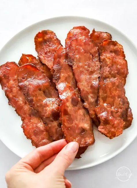 You are going to love this air fryer turkey bacon, a healthier and leaner option compared to traditional pork bacon. This breakfast recipe is perfect for busy mornings, offering a great way to enjoy crispy bacon with fewer calories and less mess. It is a great way to cook bacon with less grease and easy cleanup. A quick, healthy, and delicious breakfast recipe! Air Fryer Turkey Bacon, Bacon In Air Fryer, Ninja Foodi Grill Recipes, Grill Bacon, Turkey Bacon Recipes, Lime Chicken Breast, Ninja Foodi Grill, Bacon Snacks, Air Fryer Turkey