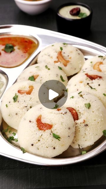 Aarti Madan on Instagram: "Instant Rawa Idli. I love this recipe and make it often for my breakfast. Do give it a try ❤️

Ingredients

2 tablespoons oil
1 teaspoon mustard seeds/ rai
1 teaspoon urad dal
1 teaspoon roasted chana dal
1 teaspoon ginger, finely chopped
1 teaspoon green chillies, finely chopped
1 cup (170g) semolina/suji/rawa
1 tablespoon fresh coriander, finely chopped
1 cup (240g) curd/dahi
¾ cup water (approximately)
1 eno (fruit salt) sachet or ½ teaspoon baking soda
salt to taste
8-10 roasted cashews

Steps In Making Instant Rawa Idli

1. Heat oil in a kadai. Now add mustard seeds, urad dal and roasted chana dal and cook for a few seconds or till the dal gets a light golden brown colour.

2. Now add finely chopped ginger and green chillies and cook for another 10 seconds. Rawa Dosa Recipes, Rawa Idli Recipe, Suji Idli Recipe, Idli Sambhar, Dosa Recipes, Idli Recipe, Chana Dal, Urad Dal, Dosa Recipe