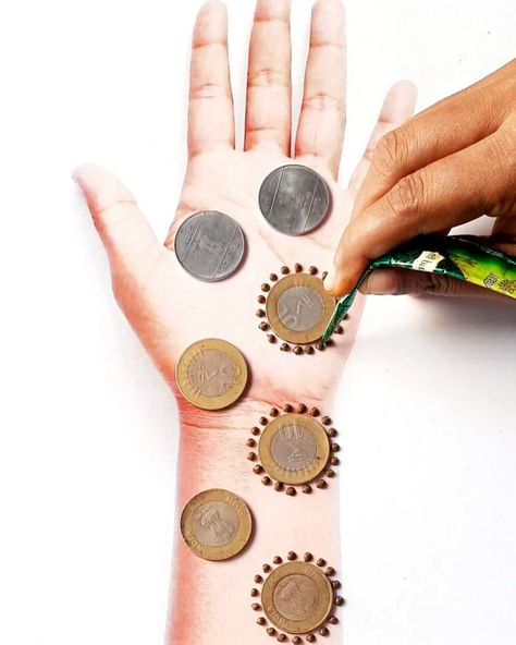 Easy Mahendi Design Skills with Coins 🪙🪙🪙🪙🪙🪙 | design, skill | Easy Mahendi Design Skills with Coins 🪙🪙🪙🪙🪙🪙 | By Mahendi Magic | Facebook Coin Design, Mehndi Design, Design Skills, Mehndi Designs, Coin, Design