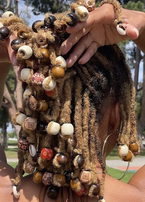 Afrocentric Loc Styles, Loc Styles Beads, Locs With Beads And Shells, Beads On Dreads Locs, Loc Bead Styles, Earthy Locs, Shoulder Length Dreadlocks, Protective Hairstyles For Growth, Loc Styles With Beads