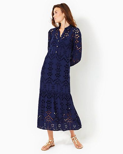 Easy fit, long sleeve, midi shirtdress with a tall hem ruffle, detachable sash, and a separate jersey slip lining. 53" from top of shoulder to hem (based on a size small/4). This style runs small, we suggest sizing up. Soiree Eyelet (100% Rayon). Dry clean only. Imported. Introducing the Zia Eyelet Midi Shirtdress. Chic and comfortable, this dress features an easy fit, tall hem ruffle, and comes complete with a separate sash and jersey slip lining for a versatile and stylish look. Eyelet Long Dress, Eyelet Fashion, Navy Blue Maxi Dress, Easter Dresses, Midi Dress Plus Size, Cocktail Party Dresses, Easter Dress, La Fashion, 2024 Fashion