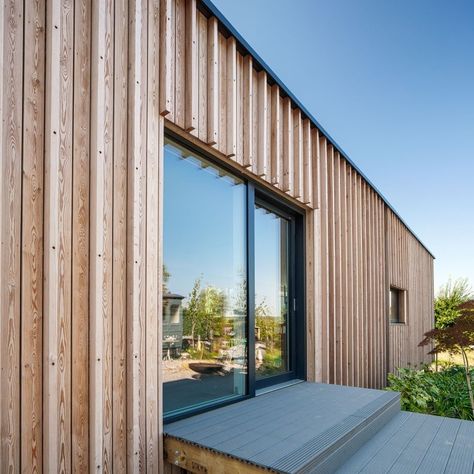 Painted Timber Cladding | Millworks Timber Cladding Architecture, Timber Batten Facade, Board And Batten Cladding, Timber Cladding Detail, Charred Timber Cladding Extension, Mass Timber Architecture Facade, Plywood Board, Larch Cladding, House Cladding