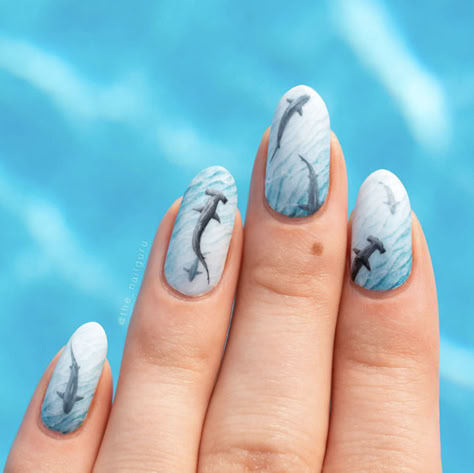 These ocean nails include designs featuring fish nail art, beach scenes, and pretty waves. Wear them to the shore all summer long. #ocean #nails #nailart Sea Creature Nails, Nail Art Beach, Shark Nail Art, Mermaid Transformation, Beach Nail Ideas, Fish Nail Art, Nail Ideas For Summer, Fish Nails, Ocean Nails