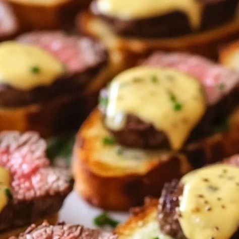 miarecipes on Instagram: "🥖🥩 Grilled Beef Tenderloin Crostini with Béarnaise Sauce🥖🥩 
Ingredients:
1 baguette loaf
3 tbsp olive oil
2 beef tenderloin filets (about 6 oz each, 2 inches thick)
1 package of béarnaise sauce mix
Kosher salt and freshly ground black pepper
Fresh chives, chopped, for garnish
Directions:
Remove the beef tenderloin filets from the refrigerator about 30 minutes before grilling to bring them to room temperature.
Preheat your grill to medium heat, around 350-375°F (175-190°C).
Slice the baguette on a diagonal into ½-inch thick slices and arrange them on a large baking sheet. Brush both sides of each slice with olive oil.
Grill the baguette slices until lightly toasted on both sides. Remove from the grill, lightly sprinkle with kosher salt, and set aside. These can Beef Tenderloin Crostini, Tenderloin Crostini, Béarnaise Sauce, Grilled Beef Tenderloin, Baguette Slices, Bearnaise Sauce, Sliced Baguette, Grilled Beef, Beef Tenderloin