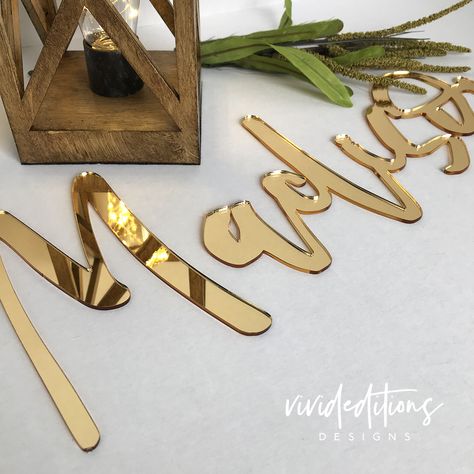 Gold Mirror Acrylic Name Sign. Perfect for Wedding Backdrops, Nursery, Birthday Party. #goldnamesign #weddingbackdrop #nurserynamesign #scriptnamesign #goldnamesign #goldmirrorname #goldmirrorbackdrop Mirror Name Sign, Boxwood Hedge Wall, Orlando Studios, Mirror Letters, Wedding Backdrops, Rose Gold Wallpaper, Perfect Birthday Party, Wood Name Sign, Mirror Sign