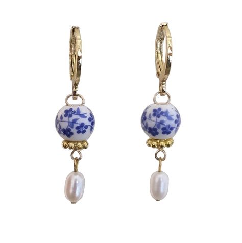 PRICES MAY VARY. These gold huggie hoops are made with genuine freshwater pearls. Each item is manufactured to the highest quality specifications and made to meet the expectations of buyers. These earrings are adorned with a 0.5 inch ceramic bead, with a classic blue floral pattern, are dainty and delicate and so perfect for many occasions! You and your families will absolutely love these earrings, they are exactly as pictured and very beautiful. Tantastic quality,these earrings are even more pr Earrings Small Hoop, Gold Huggie Earrings, Blue Porcelain, Small Hoop Earrings, Huggie Earrings, Earrings Blue, Small Earrings, Ceramic Beads, Jewelry Earrings Hoops