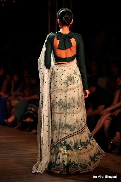 Fancy Flaunting in Flirty Femininity: The Tail of the Bow Backed Saree Blouse Style Blouse With Ribbon Bow, Ribbon Blouse Design, Hp Outfit, Blouse Sabyasachi, Sabyasachi Blouse, Sari Blouse Styles, Sari Blouses, Giant Bow, Slides Outfit